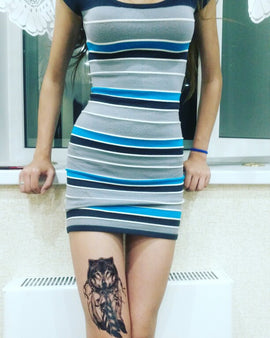 Wolf with Feather tattoo